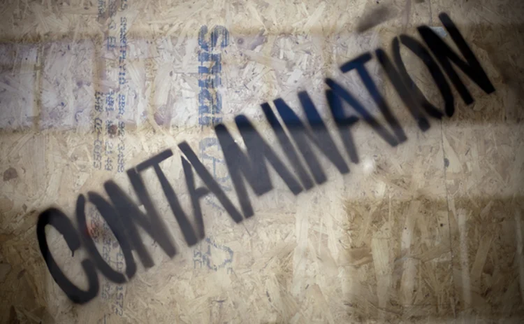 The word contamination written on a case containing bio waste