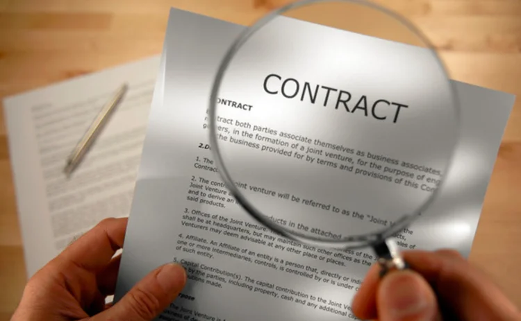 Contract under magnifying glass