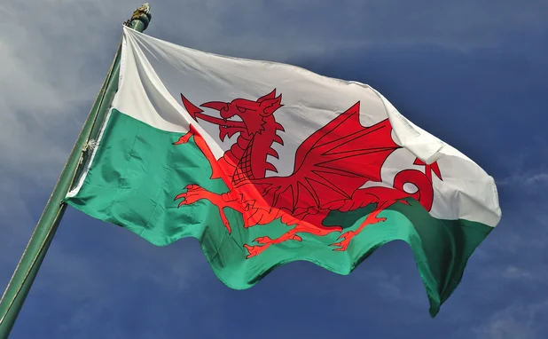 Welsh flag set against blue skies