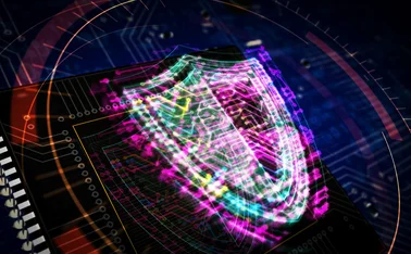 Digital shield overlaid on abstract computer circuit board background 