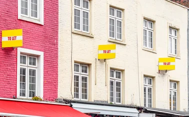 Colourful terraced houses with TO LET signs around Camden Town in London