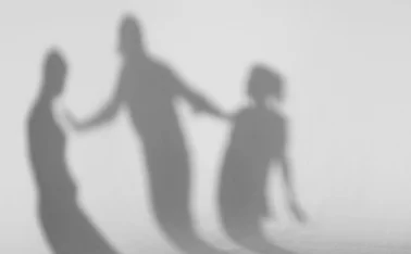 Shadows standing in front of white background 