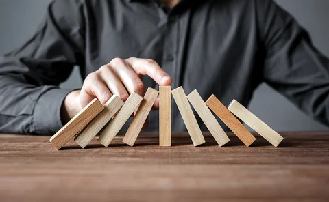 stopping dominoes falling