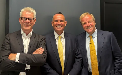 Stuart Reid (left) and Toby Clegg (right) with Dave Martin