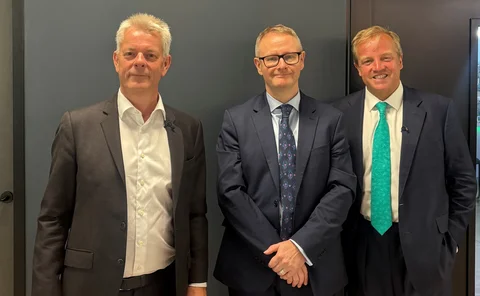 Stuart Reid (left) and Toby Clegg (right) with Matthew Hill