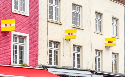 Colourful terraced houses with TO LET signs around Camden Town in London