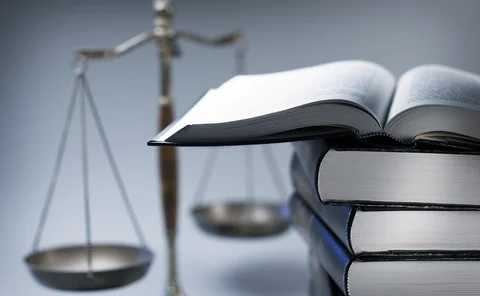 Scales of justice and law books