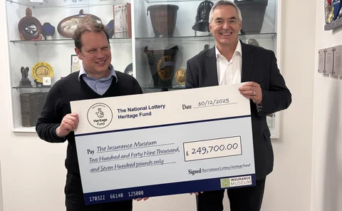 Cheque being handed over to Insurance Museum from National Lottery