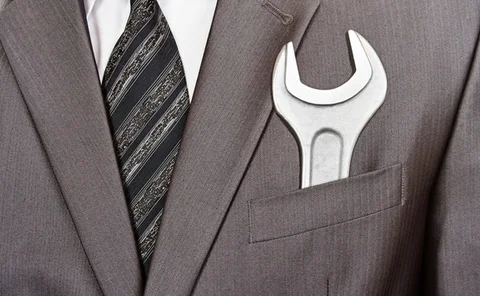 spanner-in-businessman-suit-pocket-18943423