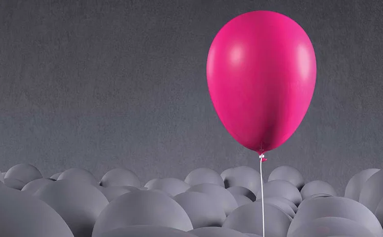 Pink balloon with grey balloons