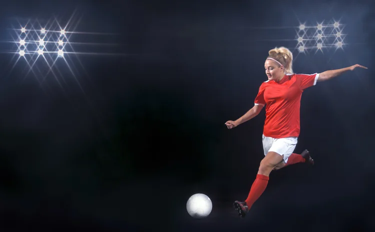 Female footballer and ball_for CMS