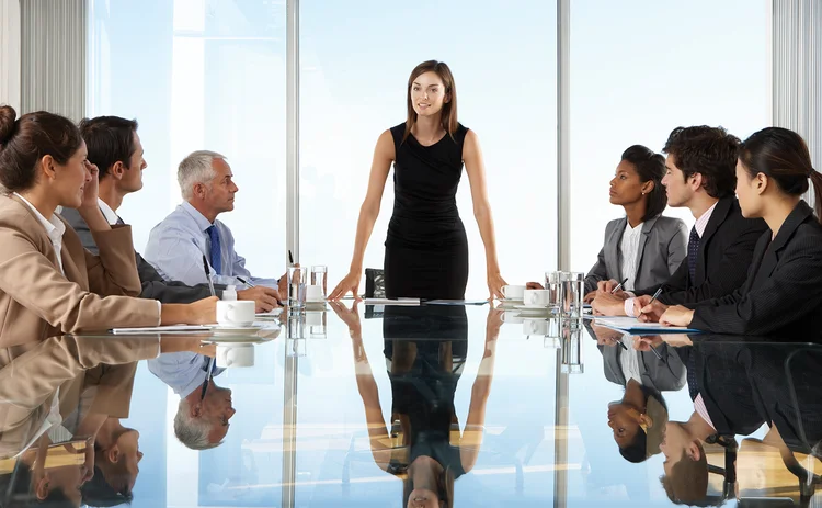 Women leading boardroom meeting