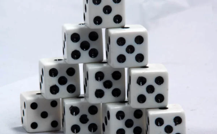 Ten dice displaying the number five