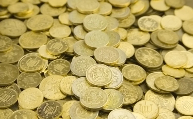 Pile of one pound coins