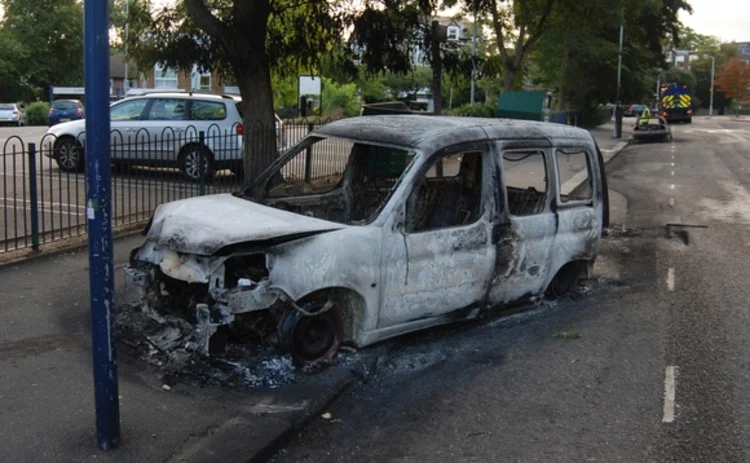 Image of a burnt-out car in Lewisham