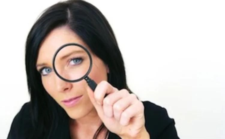woman-magnifying-glass