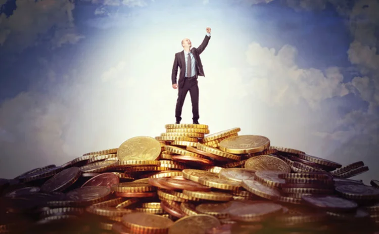 businessman-pile-coins