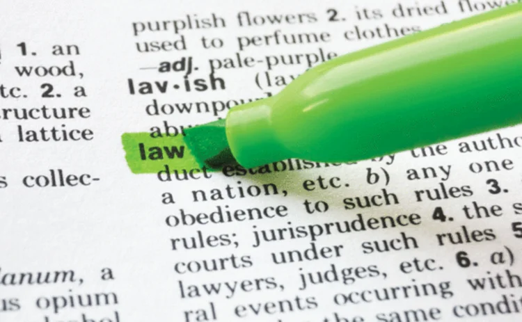 The word law highlighted in a dictionary
