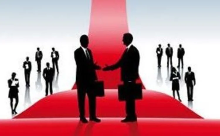 Businessmen agreeing over a handshake