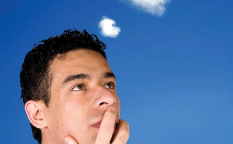 Man thinking about clouds