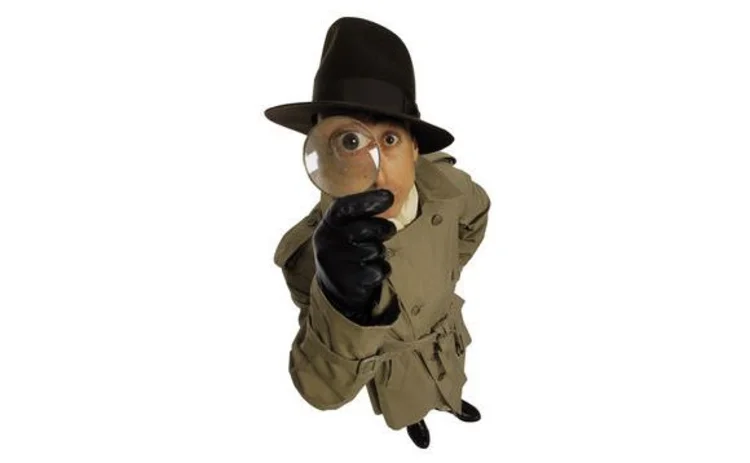 A detective with a magnifying glass