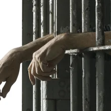 A man behind bars